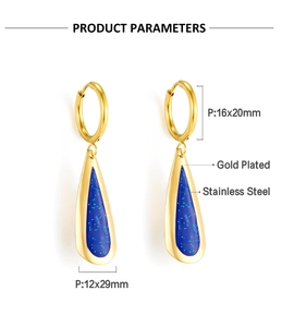 Detail showing gold plated stainless steel hoop earrings with blue star glitter teardrops