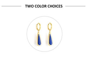 Detail of golden double-layer heart earrings with deep blue glitter teardrop charms