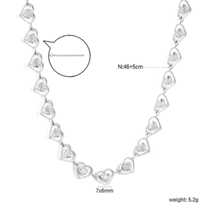 Detail showing hollow heart chain dimensions 7x6mm and 46cm necklace length with extension
