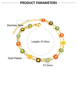 Detailed view of gold-plated stainless steel anklet with colorful enamel flower charms