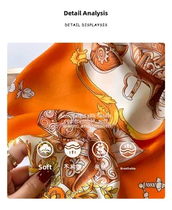 Detail of soft silk-like fabric featuring vintage orange floral and crest patterns