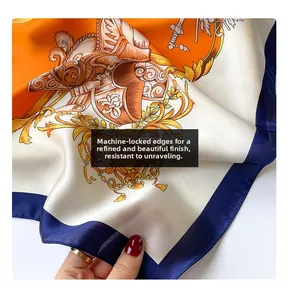 Detail of baroque pattern silk square scarf featuring professional machine-hemmed edges