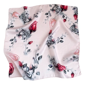 Pink mulberry silk neckerchief with red rose floral patterns on a white background