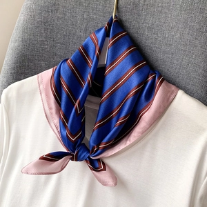 Classic striped silk scarf for women featuring navy blue and reddish-brown patterns