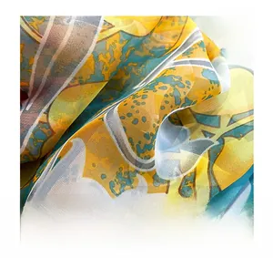 Detail view of high-quality overlock stitching on floral silk scarf edges and fabric texture