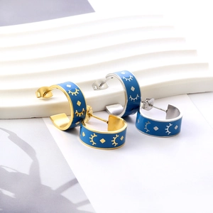 Retro C-shape hoop earrings with blue enamel sun patterns in gold and silver finish