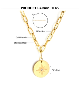 Detailed view of gold-plated stainless steel star pendant and paperclip chain necklace