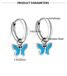 Detail view of blue butterfly drop earrings with 11mm stainless steel hoops
