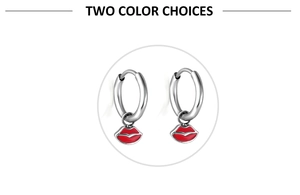 Detail of silver stainless steel hoop earrings with glossy red enamel lip pendants
