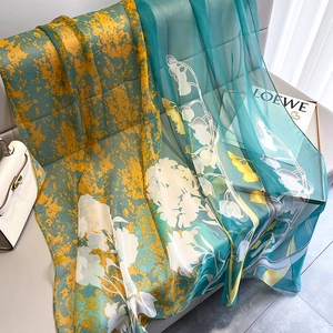 Elegant floral silk shawl with white lily of the valley print on blue yellow gradient