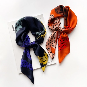 Silk leopard print scarf for women with elegant abstract pattern and smooth satin finish