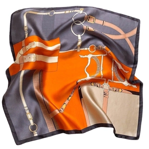 Luxurious mulberry silk scarf with classic equestrian pattern in orange and navy blue