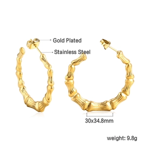 Detailed view of bamboo-shaped gold plated stainless steel earrings with 30x34.8mm size