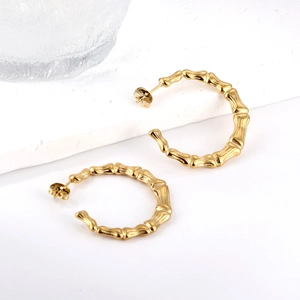 18K gold plated stainless steel C-shaped bamboo texture hoop earrings on stone