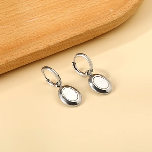 Silver oval shell earrings with geometric metal charms for women's fashion wear