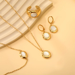 Elegant gold-plated stainless steel jewelry set featuring white shell stone inlay accents