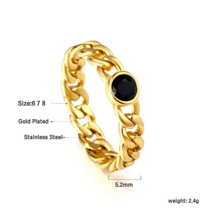 Macro detail of a gold-plated chain ring featuring a 5.2mm round black gemstone inlay
