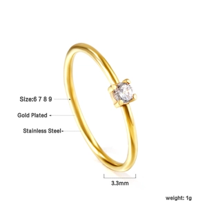 Macro detail of gold plated stainless steel ring featuring 3.3mm width and round zircon