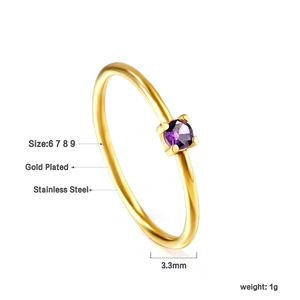 Detailed view of gold-plated stainless steel ring with 3.3mm purple zircon in claw setting