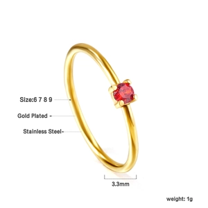 Detail of 18K gold plated stainless steel ring with 3.3mm red cubic zirconia stone