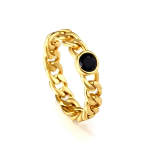 Vintage golden Cuban link chain ring with a centered round black gemstone in a 45-degree view