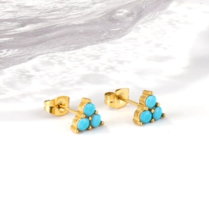 Golden triangle stud earrings with vibrant sky blue beads and classic butterfly backs