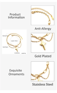 Detail view of double-layer gold plated stainless steel bracelet with star charm