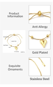 Macro detail of gold-plated stainless steel heart charm bracelet with size measurements