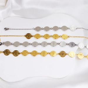 Sint-Benedictus penning armband in goud en zilver met een handige karabijnsluiting