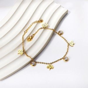 Minimalistisches Fußkettchen aus Gold mit Blattanhängern und runden Zirkoniasteinen