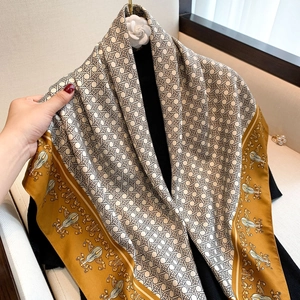 Elegant silk scarf with geometric weave and vintage violin baroque pattern in gold