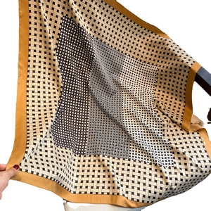 Elegant geometric print silk-feel square scarf with classic brown basketweave pattern