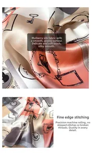 Detail of silk scarf with vintage key patterns and machine-rolled hem finish