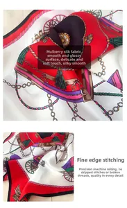 Detail of silk scarf showing classic horse carriage pattern and machine-rolled edges