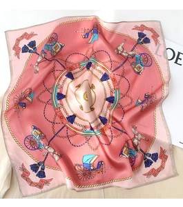 Detail of silk scarf showing vintage horse carriage prints and satin fabric texture