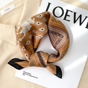 Elegant mulberry silk square scarf featuring ginger yellow paisley and horse patterns