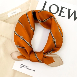 Elegant orange silk square scarf with vintage belt print on a minimalist background