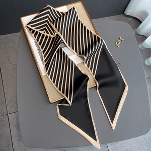 Elegant black and beige geometric stripe twilly scarf on a luxury minimalist background