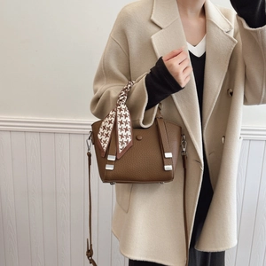 Brown litchi grain bucket bag with houndstooth silk scarf handle and long strap