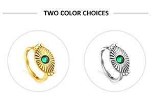 Detailed comparison of gold and silver retro rings with green gemstone and oval shield