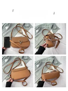 Detailed views of brown faux leather crossbody bag with silver horseshoe buckle closure