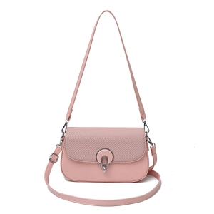 Minimalist pink crossbody bag for women with flap texture and silver ring buckle detail