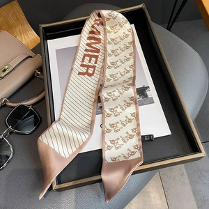 Elegant champagne and brown floral silk twilly scarf featuring horse patterns and Summer text
