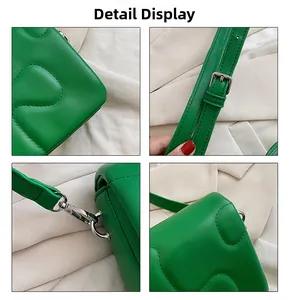 Detail view of wavy quilted stitching and silver buckle on bright green crossbody bag