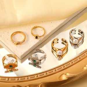 Retro multi-style ring set with pearls, emeralds and zircon on a gold-plated finish