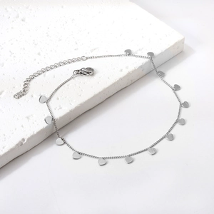 Minimalist silver chain anklet with dangling heart charms and adjustable lobster clasp closure