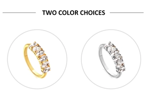 Detail view of two vintage-style eternity rings with seven oval-cut zircons in gold and silver