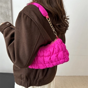 Quilted cloud shoulder bag in hot pink fabric with gold chain strap for women