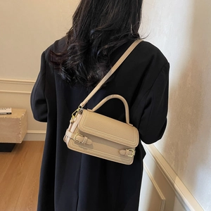 Fashionable beige lychee pattern square handbag with top handle and crossbody strap