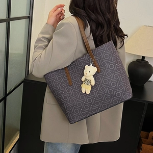 Large grey tote bag with daisy letter print and brown leather straps for women